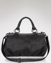 Cornelia Guest's woven satchel is an understated design with a humane secret. Made from a unique faux leather, it's a luxurious day-to-day option for the woman craving an animal-friendly alternative.