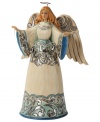 Full of great joy, this angel welcomes the Christmas spirit into your home. While striking blue and silver hues dance across her robe & wings, her calm expression & peaceful countenance create an undeniable warmth.