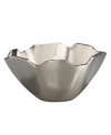 A rugged edge and elegant fluting in lustrous Nambe metal give this bowl from the Small Rocks serveware and serving dishes collection a bold, southwestern sensibility. Use for entertaining and decorating.