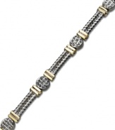 Try a trendy two-tone style. This intricate cable link bracelet is crafted in 14k gold and sterling silver for a versatile touch. Approximate length: 7 inches.