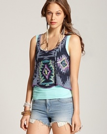 Rock the global trend in this Free People tribal print tank--lively with pops of pink and turquoise embroidery juxtaposed against earthy tones for the perfect summer look.