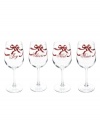 Offering four more reasons to make a toast, Holiday Garden wine glasses from Martha Stewart Collection are all wrapped up in neat red bows with words of seasonal inspiration: Joy, Cheers, Noel and Peace.