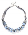 Shake up your style with c.A.K.e. by Ali Khan's shimmery cluster necklace. Blue and clear crystal beads (10-14 mm) add a sparkling effect to a trendy grosgrain ribbon and mixed metal setting. Approximate length: 18 inches + 3-inch extender.