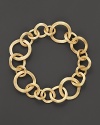 Beautifully textured 18K yellow gold links make a striking statement. By Marco Bicego.