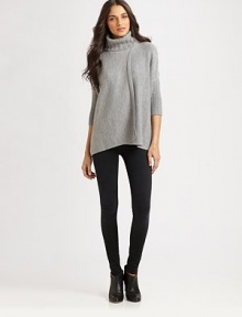 A contemporary take on the timeless turtleneck, this lengthy wool and cashmere sweater has overlapping panels and exaggerated dolman sleeves. Ribbed turtleneckThree-quarter dolman sleevesRibbed cuffsOverlapping panelsAbout 28 from shoulder to hem90% wool/10% cashmereDry cleanImportedModel shown is 5'9 (176cm) wearing US size X-Small/Small.OUR FIT MODEL RECOMMENDS ordering one size down as this style runs large. 