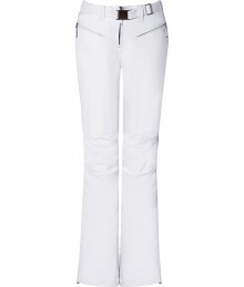 Make a chic statement on the slopes in Jet Sets bright white ski pants, finished with a flattering cut guaranteed to show off your sporty side in style - Zip fly, zippered front pockets, adjustable belt in front, straight leg with silver star circle print, flared zippered ankles, elasticized band at the ankle with silicon for hold - Fitted through the knee - Wear with figure-hugging turtlenecks and cozy shearling lined boots