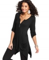 Create a relaxed look with Cha Cha Vente's knit tunic. The asymmetrical hem is a chic on-trend touch, too!