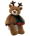 Ready for a ride on Santa's sleigh, this lovable, huggable teddy bear from Gund wears Rudolph's antlers and a holiday scarf.