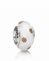 A whimsical murano glass charm with a playful polka dot pattern. Logo-engraved sterling silver trim expresses the PANDORA signature.