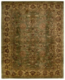 For the Jaipur collection Nourison uses a unique herbal wash to create the silky sheen and antique appearance of these fine wool rugs. In rich olive green with blooms and vines aplenty, the rug enhances your home with lavishly elegant style.