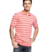 Sharp stripes lend a sporty touch to this classic polo shirt from Club Room.