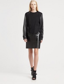 Leather sleeves, croc-print elbow patches and motorcycle-inspired details bring rocker vibes to this boxy wool-rich jacket. RoundneckAsymmetrical snap closuresDropped shouldersLong leather sleevesCroc-embossed elbow patchesSelf-beltBack rain flapAbout 27 from shoulder to hemBody: 80% virgin wool/20% polyamideTrim: LeatherDry clean with leather specialistImported of Italian fabricSIZE & FITModel shown is 5'10 (177cm) wearing US size 4. 