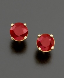 Light your look on fire. Round-cut rubies (1 ct. t.w.) add vivacity to an ordinary ensemble. Cradled in a polished, 14k gold four-prong setting for a truly classic look. Approximate diameter: 5 mm.