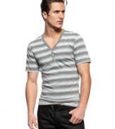 Horizontal stripes on this y-neck shirt from INC International Concepts adds depth to your denim lineup.