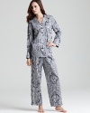 A classic pajama set in a timeless paisley print, the perfect gift for someone special.