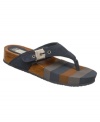 With their sassy striped pattern, Dr. Scholl's Nostalgia thong sandals recall the groovy style of the 1970s--a fun look that's back in style now more than ever! The velour suede upper features an adjustable buckle closure.