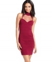 Sheer mesh insets add vixen attitude to this red-hot bandage dress from Baby Phat!