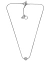 Polished to a T. Subtle shine and polished silver create a versatile style that blends with any look. Michael Kors' glass fireball pendant set in silver tone mixed metal with a toggle clasp and logo charm accents. Approximate length: 16 inches. Approximate drop: 1/4 inch.