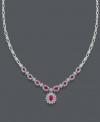 Turn your evening gown into an overall masterpiece with this sparkling accessory. Effy Collection necklace features oval-cut rubies (4-3/8 ct. t.w.) surrounded by sparkling halos of round-cut diamond (2-1/3 ct. t.w.). Set in 14k white gold. Approximate length: 17 inches. Approximate drop: 1 inch.