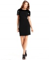 MICHAEL Michael Kors' little black dress shimmers with striking sequined detail at the shoulders.