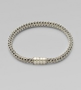 An intricately woven sterling silver chain design. Sterling silver Push clasp closure Length, about 6½ Imported 