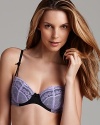 A fun and flirty foam demi bra trimmed in eyelet lace. Features ultra supportive molded cups and adjustable straps.