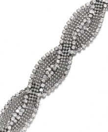 Wrap it up in sparkling style. Alfani bracelet features braided round-cut crystals set in silver tone mixed metal. Approximate length: 7-1/2 inches.