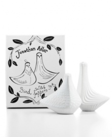 Love birds. Salt and pepper shakers from Jonathan Adler ruffle some feathers in artfully sculpted, beautifully textured white stoneware.