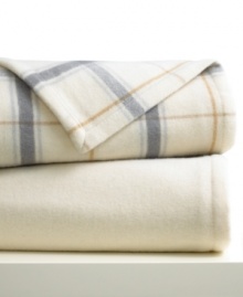 Classic comfort. Warm up the natural way with pure woven wool – a superior layer of lightweight, durable warmth for chilly autumn and winter nights, as well as the perfect accent for bedrooms and living rooms alike. Choose from solid or plaid. Packaged for easy gifting.