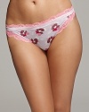 A floral print bikini bottom with floral lace detail at hips and waist for the perfect accent.