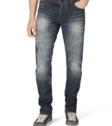 A white fade and distressed details give these Calvin Klein jeans a cool edgy style.