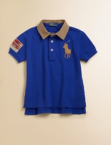 A heritage-inspired cotton mesh polo sports Ralph Lauren's Big Pony and a distressed flag patch for an authentically vintage feel.Polo collarShort sleevesButton-frontUneven vented hemCottonMachine washImported Please note: Number of buttons may vary depending on size ordered. 