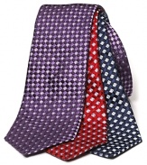 Brilliant toned silk tie covered in an eye-catching box pattern.