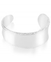 Simply elegant. Robert Lee Morris' cuff bracelet is crafted from silver-tone mixed metal with glass pave crystal accents adding sparkle. The sculptural shape only enhances the appeal. Approximate diameter: 3 inches.