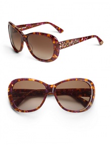 THE LOOKRounded square silhouetteVariegated handmade acetate framesEtched grid and Austrian crystals on temples, arms and tipsTHE COLORBrown and amethyst with brown gradient lensORIGINImported