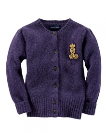 A luxuriously refined interpretation of a preppy cardigan sweater is rendered in a soft blend of wool and angora and is finished with a collegiate-inspired monogram patch.