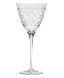 An intricate bias check pattern on this crystal wine glass adds sparkling sophistication to an elegant evening.