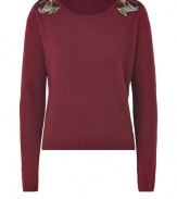 A simple, angora-wool pullover gets a hint of glamor with stylish embellishments on the shoulders - Upgraded must-have basic for the season - Silhouette features a narrow waist, round neck, long sleeves and a longer front than back - Wear with a pencil skirt, jeans or thick leggings and tall boots