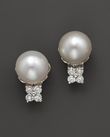 Diamonds add drama to glimmering South Sea pearls.