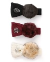 Glam it up in faux fur earmuffs with a soft knit headband accented by a cluster of sparking rhinestones.