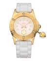 For the rich girl at heart. This round gold-plated timepiece sparkles with Swarovski crystal embellishment and Juicy heart charm bracelets. Features a white dial with gold tone Juicy crown markers. Second hand sub dial.