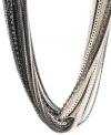 Glamour is defined by this stunning Kenneth Cole New York style. A twinkling torsade necklace features intertwined chains in silver and hematite tone mixed metal accented by sparkling crystal cup chains. Approximate length: 18 inches + 3-inch extender.