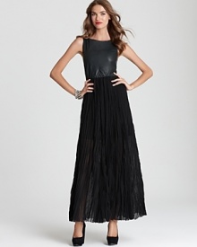 Luxe leather and of-the-moment pleats meet on this statement Alice + Olivia maxi dress, downtown-minded for evening whether it's dinner you have planned or an al fresco cocktail party.