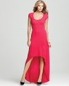 An elongated back hem lends major drama to this head-turning BCBGMAXAZRIA dress, accentuated by an eye-popping hue.