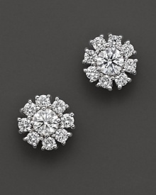 White gold diamond flower cluster earrings. With signature ruby accent. Designed by Roberto Coin.