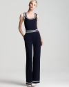 An elegant rendition of the nautical theme, this Philosophy di Alberta Ferretti jumpsuit features a chic crisss-cross back and glamorous gold hardware. A trend-right flare leg silhouette completes the look, a must-have for your upcoming getaway.