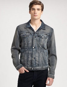 A denim wardrobe essential, uniquely crafted in a comfortable stretch cotton, and treated unevenly to create striking highs and lows.Button-frontChest flap, side slash pockets89% cotton/11% polyesterMachine washMade in USA