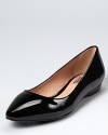 Endlessly versatile, the Bree flats from Pour La Victoire are finished in luxe, glossy patent leather.