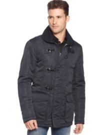 Armani Jeans quotes the masculine glamour of the firefighter's coat in this three-buckle jacket with a shorter cut and sexier, close-to-the-body silhouette.