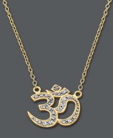 Practice harmony, peace and bliss. Made popular by yogis near and far, Studio Silver incorporates the symbolic om symbol in a pretty, sparkling pendant. Crafted in 18k gold over sterling silver with round-cut crystal accents. Approximate length: 16 inches + 2-1/2-inch extender. Approximate drop: 1/2 inch.